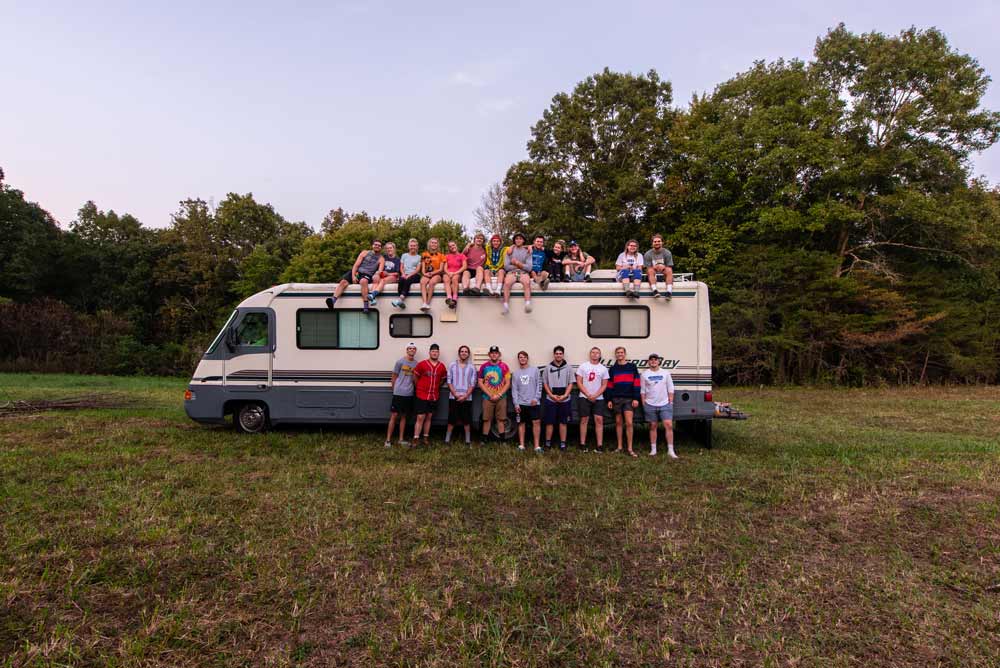 Group around n RV parked at a Camp area at Hammock'Sway